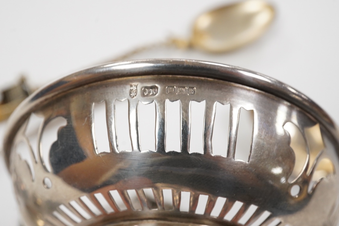 A small group of silver including an Edwardian miniature model of a throne by Edward Foligne Braham, Birmingham, 1901, 50mm, a small comport, one part of a belt buckle and three commemorative spoons, together with a gilt